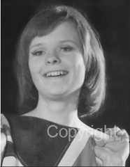 Short hair girl with flag late 1960's